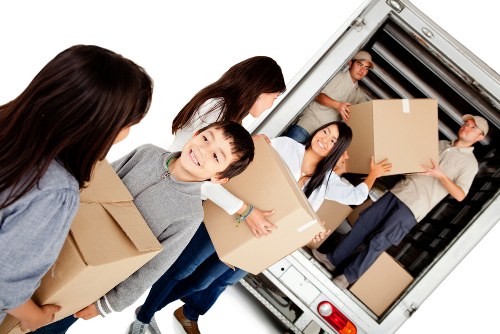 Furniture being carried during a Docklands removal service