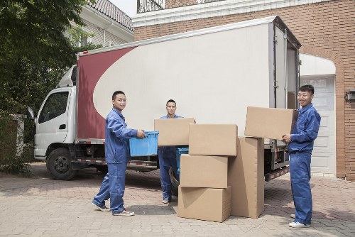Removal team handling apartment move in Docklands