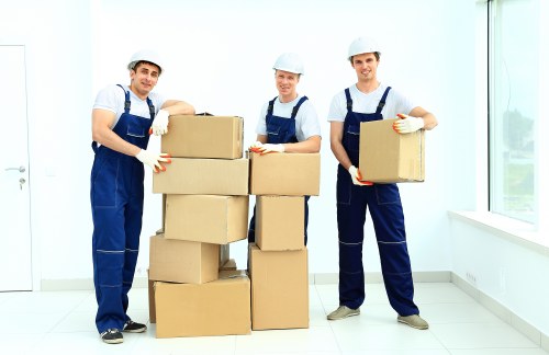 Docklands apartment moving scene with removal team planning access