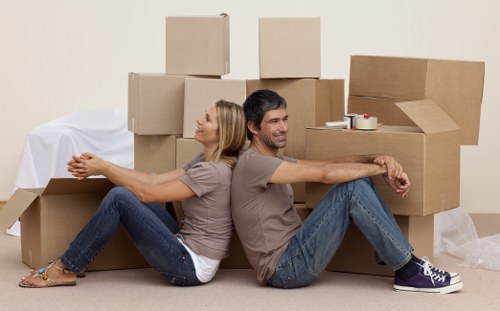 Careful loading of belongings for a Docklands man with van service
