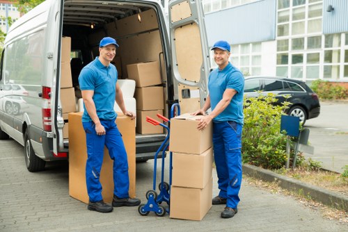 Loading boxes and furniture for a move in Docklands