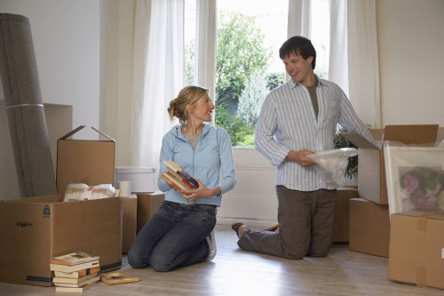 Professional removalists loading furniture for a Docklands home or office move