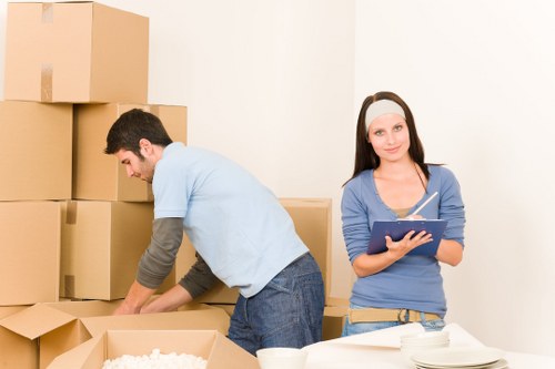Professional movers loading furniture for a Docklands removal service