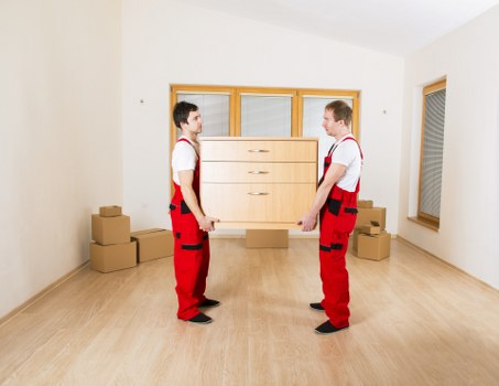 Local removals van ready for an apartment move in Docklands