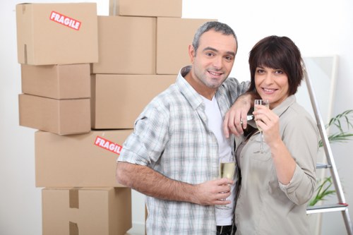 Docklands moving team handling items with care in urban area